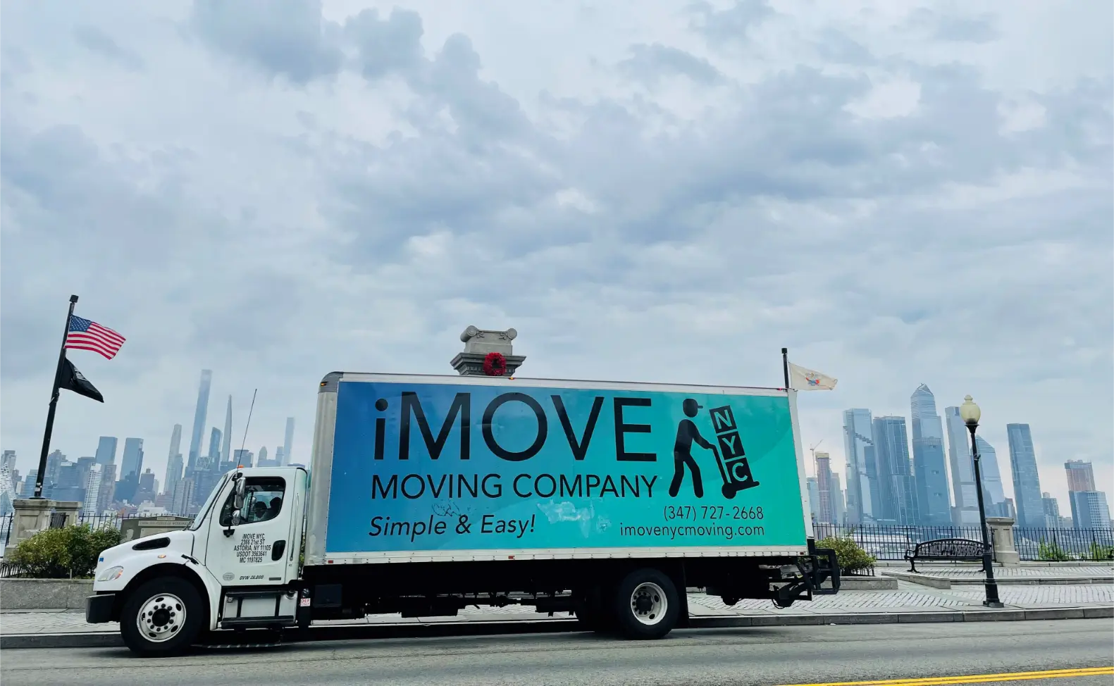 iMOVE NYC Truck Parked in Front of Manhattan Skyline