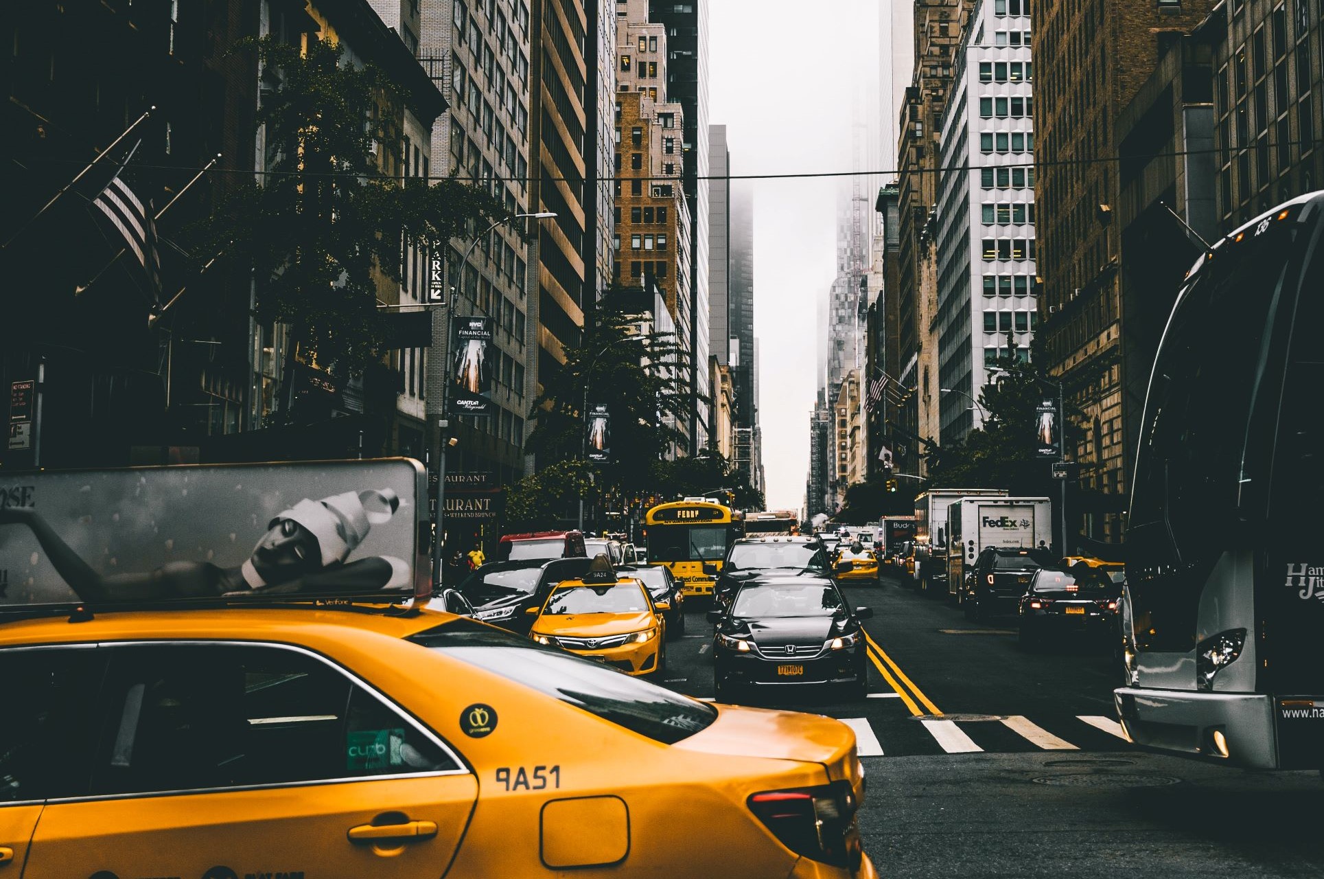 Midtown Street Photo on a Cloudy Winter Day with Yellow NYC Cab in Focus