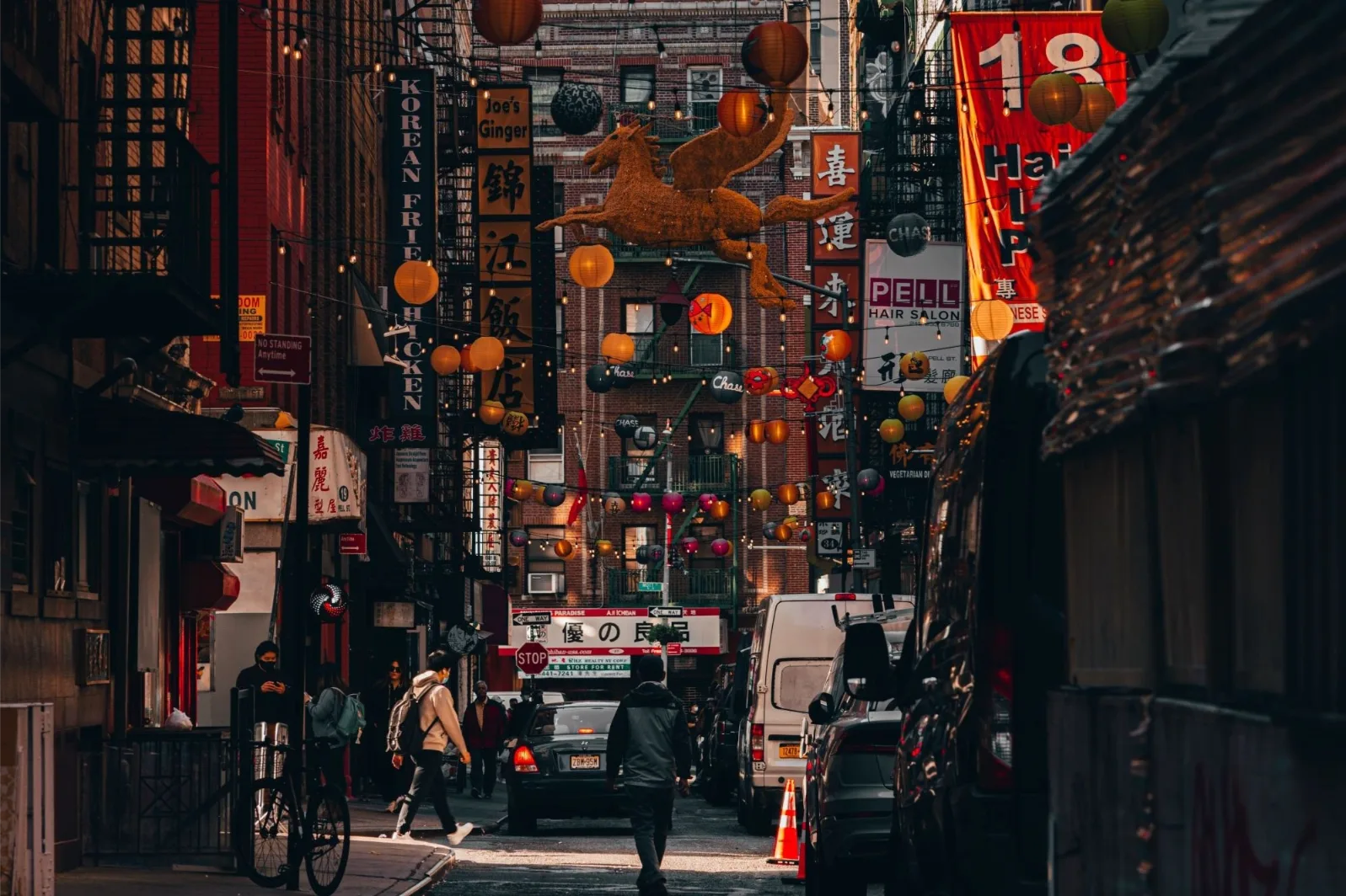 Street Photo of People Waking around Decorated Chinatown in New York City