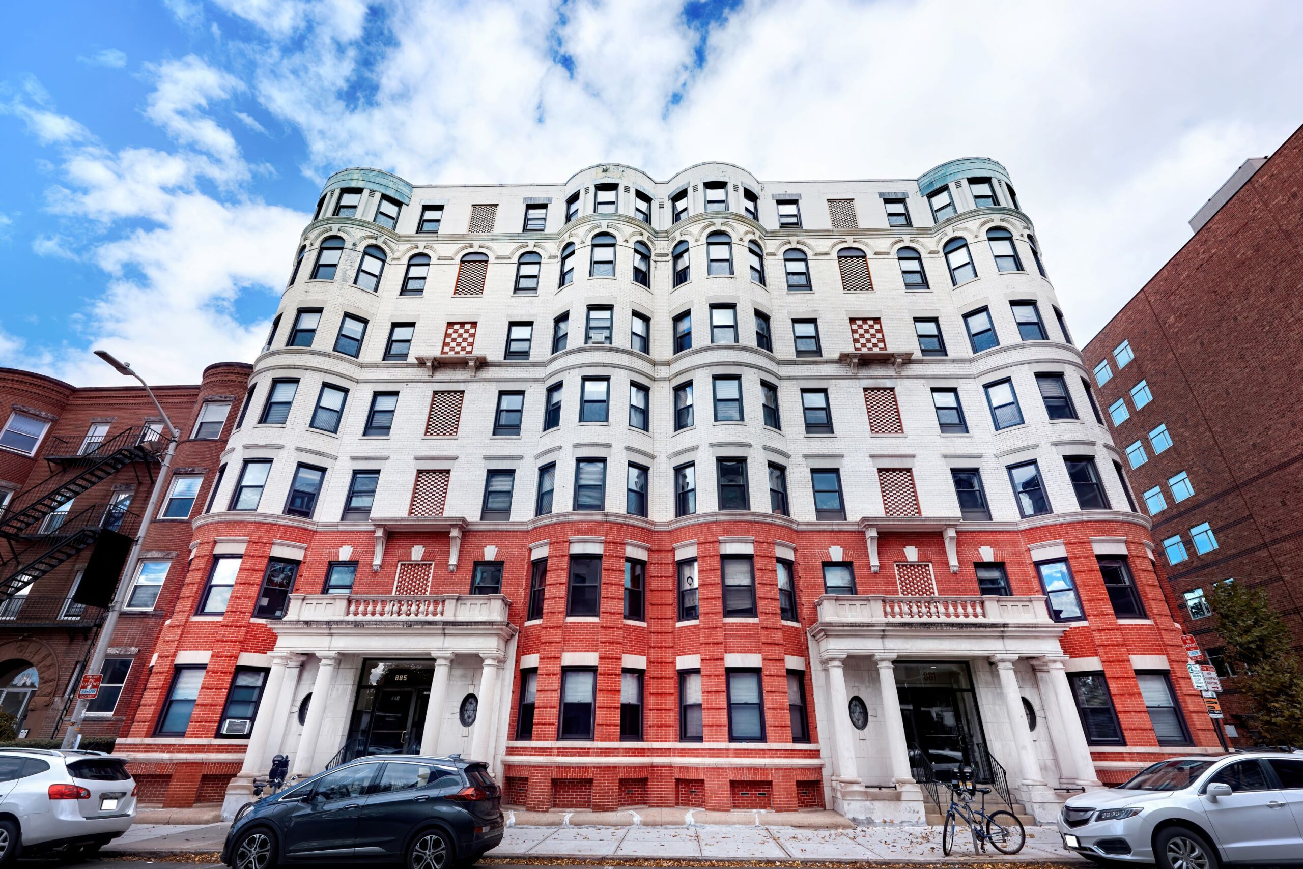 A Beautiful 6 Story Building in Manhattan With Cream and Orange Facade