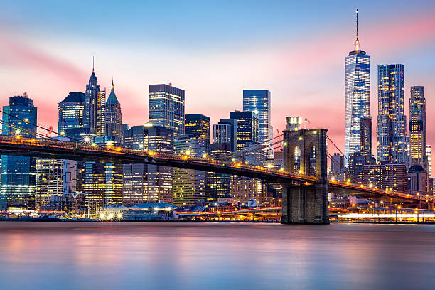 Brooklyn Bridge and the Lower Manhattan Skyline Under the Purple Sunset