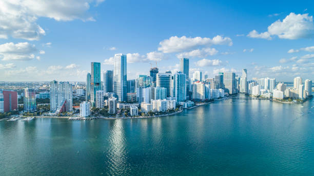 An Aerial Shot of Brickell Key with Downtown Cityscape Surrounded by Ocean